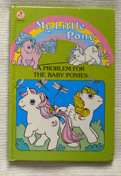 Size: 651x945 | Tagged: safe, derpibooru import, baby moondancer, baby surprise, firefly, glory, dragonfly, insect, pegasus, pony, unicorn, g1, baby, baby pony, book, book cover, bow, cover, female, filly, foal, horn, mare, official, tail, tail bow