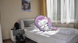 Size: 1080x606 | Tagged: safe, derpibooru import, potion nova, pony, unicorn, all that jitters, g4, g4.5, my little pony: pony life, bed, horn, irl, photo, ponies in real life, sleeping, solo