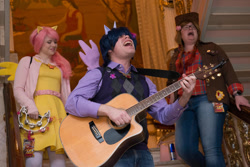 Size: 1024x684 | Tagged: safe, artist:karredroses, artist:the shake ups, derpibooru import, applejack, fluttershy, twilight sparkle, human, clothes, cosplay, costume, guitar, irl, irl human, musical instrument, photo, ponycon 2016, ponycon nyc, tambourine