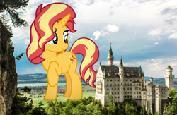 Size: 1600x1040 | Tagged: safe, artist:andoanimalia, derpibooru import, edit, editor:jaredking779, sunset shimmer, pony, unicorn, g4, castle, female, germany, giant pony, giantess, highrise ponies, horn, irl, looking back, macro, mare, neuschwanstein, photo, ponies in real life, raised hoof, raised leg, smiling, solo, story included