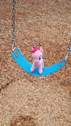 Size: 2618x4656 | Tagged: safe, derpibooru import, pinkie pie, original species, pony, cute, irl, love, object, outdoors, photo, playground, plush pony, plushie, solo, swing, swinging