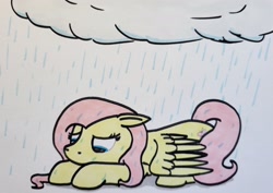 Size: 2047x1448 | Tagged: safe, artist:hoofclid, derpibooru import, fluttershy, pegasus, pony, g4, ears, floppy ears, lying down, marker drawing, prone, rain, sad, solo, traditional art