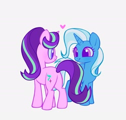 Size: 2048x1969 | Tagged: safe, artist:delzol, derpibooru import, starlight glimmer, trixie, pony, unicorn, g4, blue sclera, butt, colored eyelashes, colored pupils, colored sclera, coloreed pup, cute, diatrixes, duo, duo female, female, floating heart, glimmerbetes, grin, hair over one eye, heart, horn, lesbian, looking at each other, looking at someone, plot, purple eyelashes, purple pupils, shipping, simple background, smiling, smiling at each other, standing, startrix