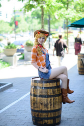 Size: 801x1200 | Tagged: safe, derpibooru import, applejack, human, g4, barrel, boots, clothes, cosplay, costume, cowboy boots, cowboy hat, hat, irl, irl human, photo, shoes