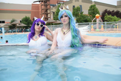 Size: 1200x800 | Tagged: safe, derpibooru import, princess celestia, rarity, human, g4, clothes, colossalcon, cosplay, costume, duo, duo female, female, irl, irl human, photo, sunglasses, swimming pool, water