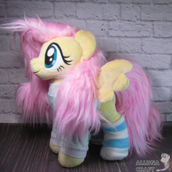 Size: 1200x1200 | Tagged: safe, artist:allunacraft, derpibooru import, fluttershy, pony, clothes, irl, photo, plushie, socks, solo, striped socks