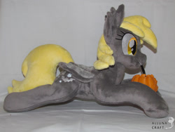 Size: 2687x2016 | Tagged: safe, artist:allunacraft, derpibooru import, derpy hooves, bat pony, pony, bat ponified, derpybat, irl, lying down, mouth hold, photo, plushie, prone, pumpkin bucket, race swap, solo, sploot