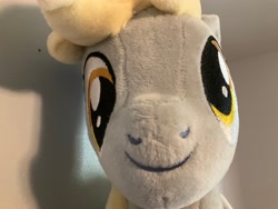 Size: 4032x3024 | Tagged: safe, artist:symbiotestudios, derpibooru import, derpy hooves, pegasus, pony, g4, bust, close-up, cute, derpabetes, female, irl, mare, photo, plushie, portrait, smiling, solo, toy