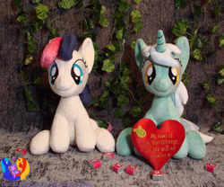 Size: 2545x2121 | Tagged: safe, artist:1stastrastudio, derpibooru import, bon bon, lyra heartstrings, sweetie drops, earth pony, pony, unicorn, fanfic:background pony, g4, duo, duo female, female, heart, heart plush, horn, irl, lesbian, lyrabon, photo, plushie, shipping