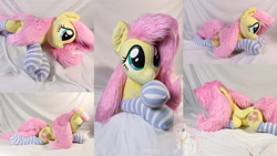 Size: 1920x1080 | Tagged: safe, artist:nakedskull, derpibooru import, fluttershy, pegasus, clothes, photo, plushie, socks, solo, striped socks