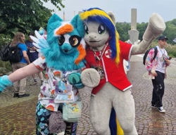 Size: 777x598 | Tagged: safe, artist:atalonthedeer, artist:eaglefly_, derpibooru import, oc, oc:eagle fly, oc:phoenix redtail, 2024, badge, convention, converse, duo focus, fursuit, galacon, irl, outdoors, photo, ponysuit, shoes