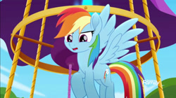 Size: 1280x716 | Tagged: safe, derpibooru import, screencap, rainbow dash, pegasus, pony, g4, cute, dashabetes, flying, hot air balloon, my little pony: rainbow roadtrip, open mouth, outdoors, solo, spread wings, wings