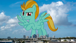 Size: 1920x1080 | Tagged: safe, artist:sketchmcreations, derpibooru import, edit, editor:jaredking779, lightning dust, pegasus, pony, g4, alternate eye color, antagonist, attack on pony, evil, female, florida, fort lauderdale, giant pony, giantess, grin, highrise ponies, irl, looking at you, macro, mare, photo, ponies in real life, raised hoof, raised leg, red eyes, smiling, spread wings, story included, wings, wrong eye color