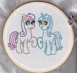 Size: 1750x1673 | Tagged: safe, artist:malte279, derpibooru import, bon bon, lyra heartstrings, sweetie drops, earth pony, pony, unicorn, g4, animated, craft, embroidery, female, gif, grin, horn, looking at you, mare, smiling, wip