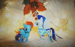 Size: 720x455 | Tagged: safe, derpibooru import, rainbow dash, soarin', pegasus, pony, christmas, female, holiday, male, mare, mistletoe, shipping, soarindash, stallion, straight, toy