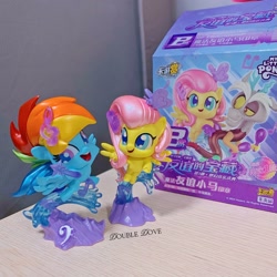 Size: 2915x2915 | Tagged: safe, derpibooru import, discord, fluttershy, rainbow dash, butterfly, draconequus, pegasus, pony, g4, g4.5, my little pony: pony life, chibi, china, chinese, kayou, merchandise, music notes