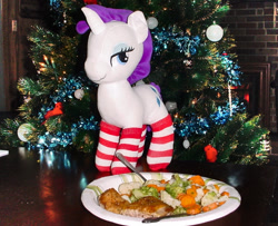 Size: 1077x873 | Tagged: safe, anonymous artist, derpibooru import, rarity, pony, unicorn, g4, christmas, christmas tree, clothes, dinner, female, food, holiday, horn, indoors, irl, mare, photo, plushie, socks, solo, solo female, tree, waifu dinner